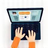 Hands typing on a laptop keyboard, representing practical work.