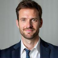 Headshot of Thomas Schneider.